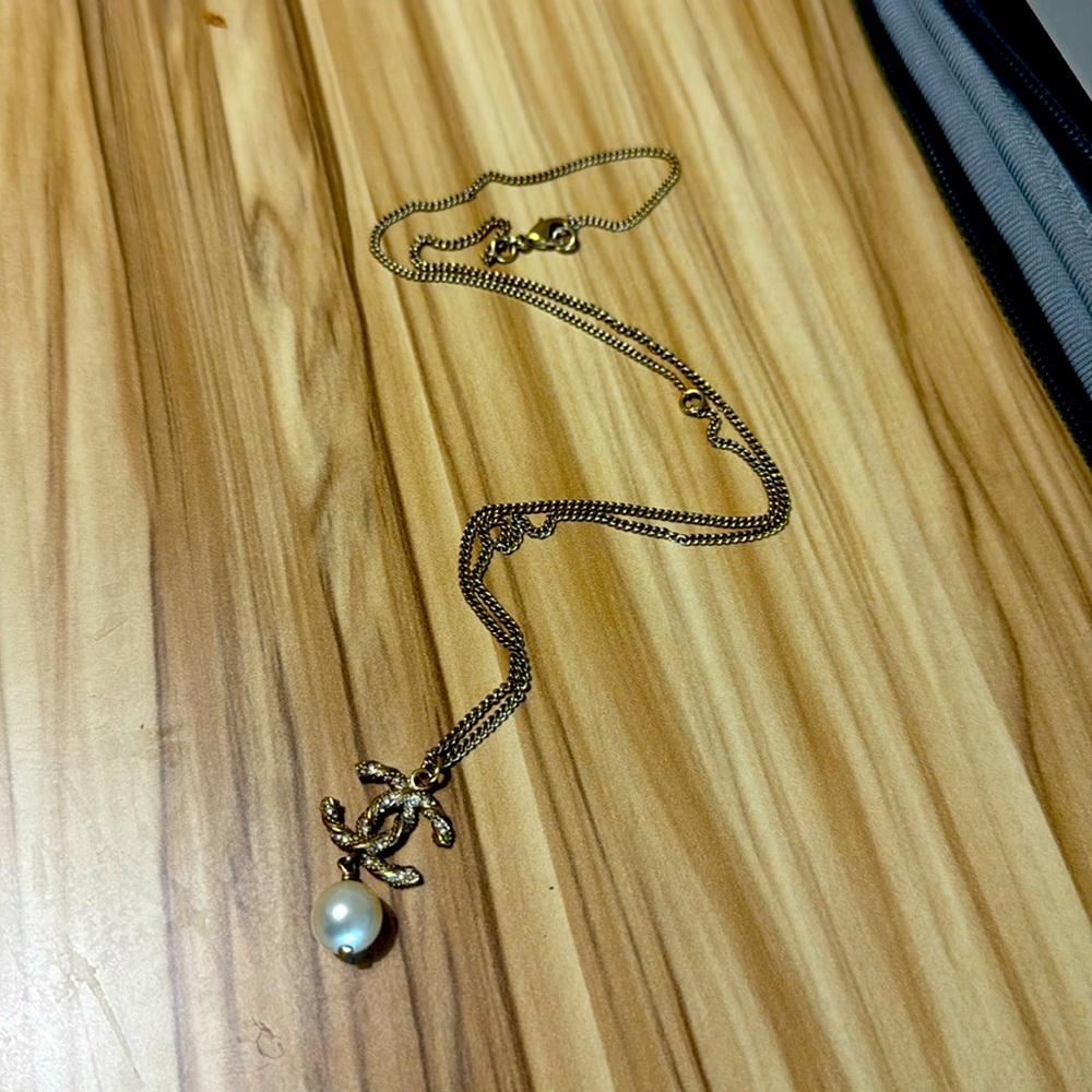 Authentic Chanel gold and pearl necklace